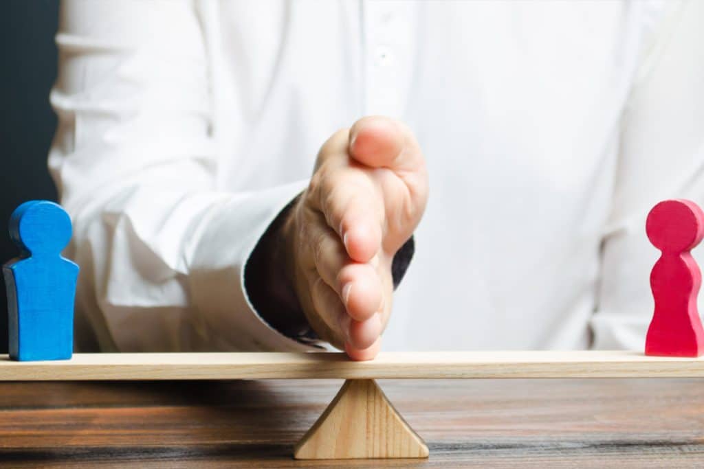 Comment obtenir une répartition équitable des biens immobiliers lors d'un divorce ?