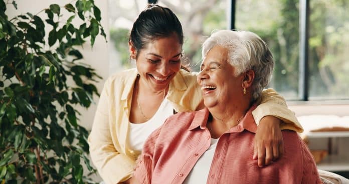 happy-younger-woman-embracing-a-laughing-senior-wo-2026-09-25-04-28-43-utc Soins en EHPAD